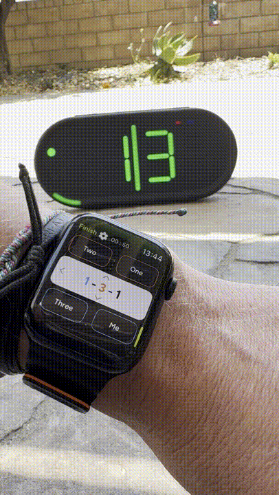 Animated gif showing how the Dropshot Scoreboard is easily controlled by an Apple Watch with a simple swiping motion.